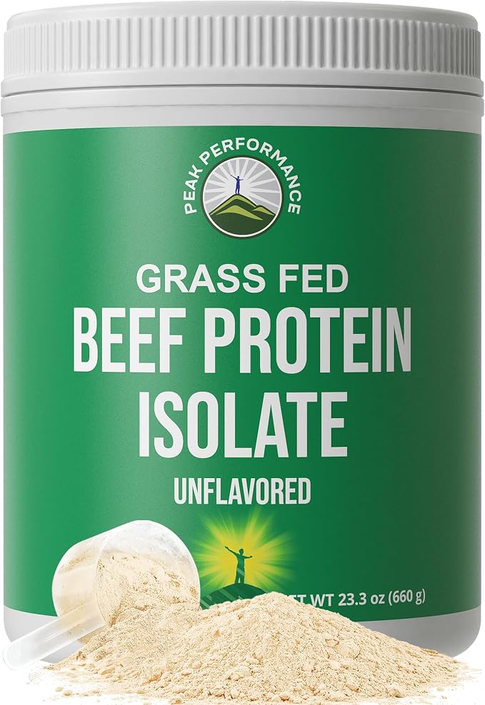A white plastic tub of Peak Performance Grass Fed Beef Protein Isolate Unflavored powder, shown with a green label and a small pile of the beige powder in front on a white background.