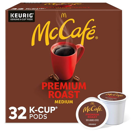 McCafe Premium Roast medium roast coffee, brown 32-count K-Cup box with red mug artwork and two pods